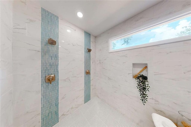 full bath featuring recessed lighting and a tile shower