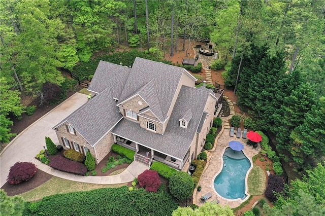 176 Nightwind Trce, Acworth, GA 30101 - aerial overview of property's location featuring a pool area and a heavily wooded area