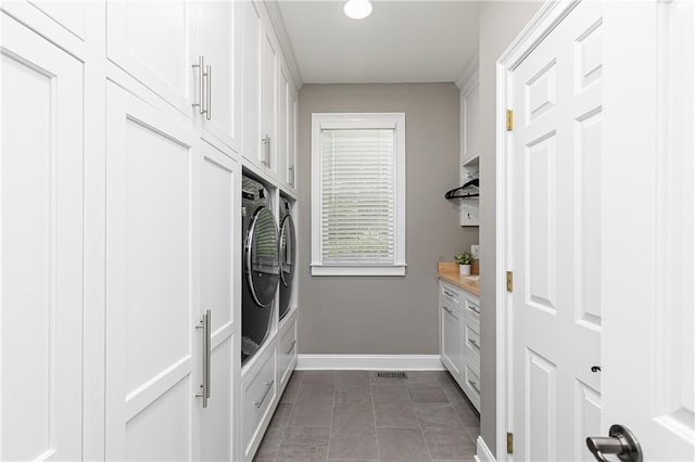 176 Nightwind Trce, Acworth, GA 30101 - washroom featuring separate washer and dryer, cabinet space, baseboards, and recessed lighting