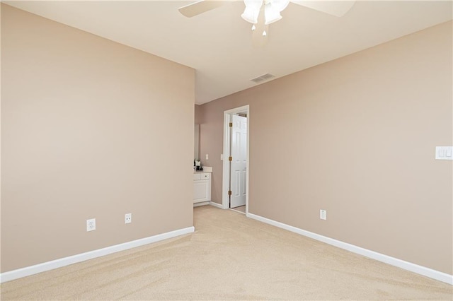176 Nightwind Trce, Acworth, GA 30101 - spare room with ceiling fan, baseboards, and light carpet