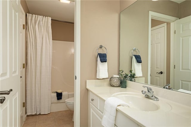 176 Nightwind Trce, Acworth, GA 30101 - bathroom with toilet, vanity, tile patterned flooring, and shower / bath combo with shower curtain