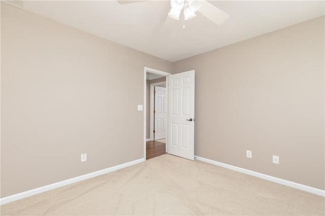 176 Nightwind Trce, Acworth, GA 30101 - unfurnished room with light colored carpet, ceiling fan, and baseboards