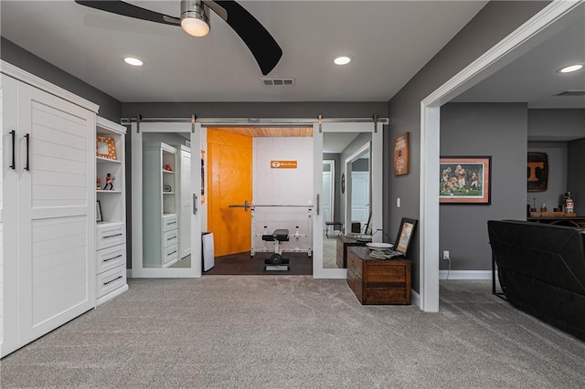 176 Nightwind Trce, Acworth, GA 30101 - carpeted bedroom with a barn door, baseboards, recessed lighting, and ceiling fan