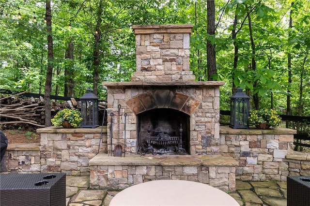 176 Nightwind Trce, Acworth, GA 30101 - view of patio / terrace featuring an outdoor stone fireplace