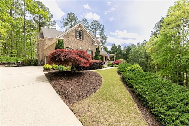 176 Nightwind Trce, Acworth, GA 30101 - view of side of home featuring driveway and brick siding