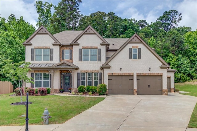 4241 Summer Breeze Way, Buford, GA 30518 - view of front of home with an attached garage, driveway, brick siding, and a front lawn