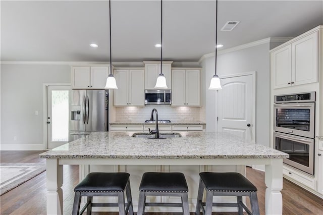 4241 Summer Breeze Way, Buford, GA 30518 - kitchen with stainless steel appliances, ornamental molding, backsplash, dark wood-type flooring, and a sink