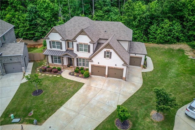 4241 Summer Breeze Way, Buford, GA 30518 - view of front of house with concrete driveway, a standing seam roof, metal roof, and a garage