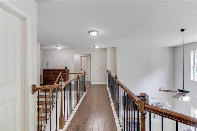 4241 Summer Breeze Way, Buford, GA 30518 - hall with an upstairs landing, dark wood-style floors, and baseboards