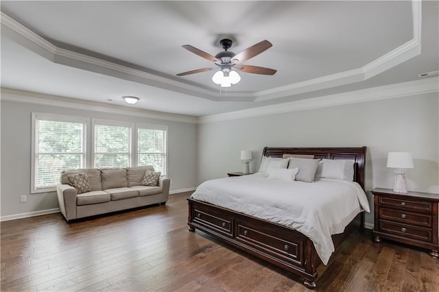 4241 Summer Breeze Way, Buford, GA 30518 - bedroom with a raised ceiling, dark wood-type flooring, ornamental molding, baseboards, and a ceiling fan