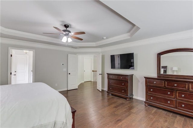 4241 Summer Breeze Way, Buford, GA 30518 - bedroom with a raised ceiling, dark wood-style flooring, baseboards, ornamental molding, and ceiling fan