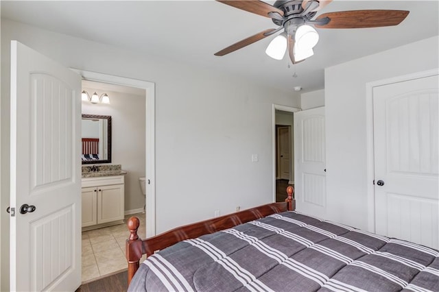 4241 Summer Breeze Way, Buford, GA 30518 - bedroom with ensuite bath and a ceiling fan
