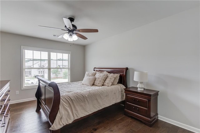 4241 Summer Breeze Way, Buford, GA 30518 - bedroom featuring dark wood-style floors, baseboards, and ceiling fan