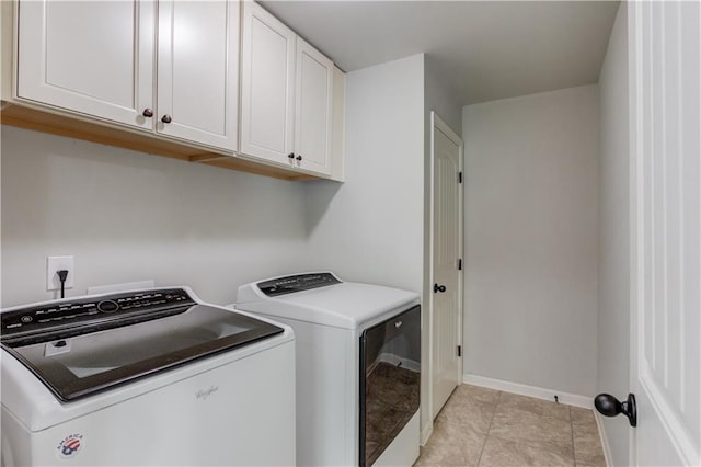 4241 Summer Breeze Way, Buford, GA 30518 - washroom featuring cabinet space, washing machine and dryer, baseboards, and light tile patterned floors