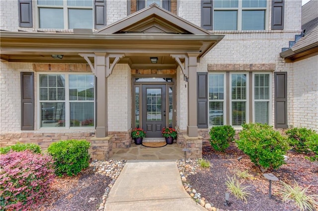 4241 Summer Breeze Way, Buford, GA 30518 - view of exterior entry with brick siding and covered porch