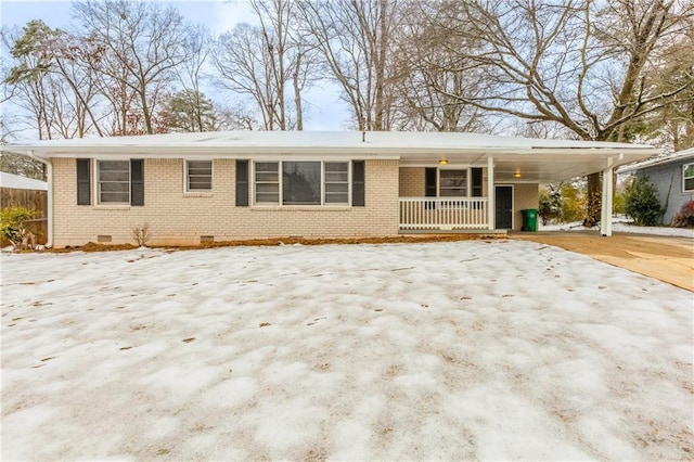 single story home featuring a carport