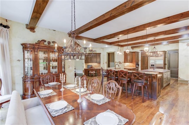 2740 Drayton Hall Dr, Buford, GA 30519 - dining space featuring light wood-type flooring, beamed ceiling, and a notable chandelier