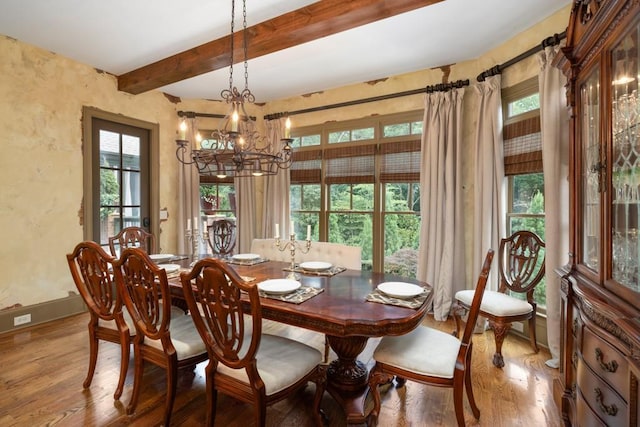 2740 Drayton Hall Dr, Buford, GA 30519 - dining area featuring a chandelier, plenty of natural light, beamed ceiling, and wood finished floors