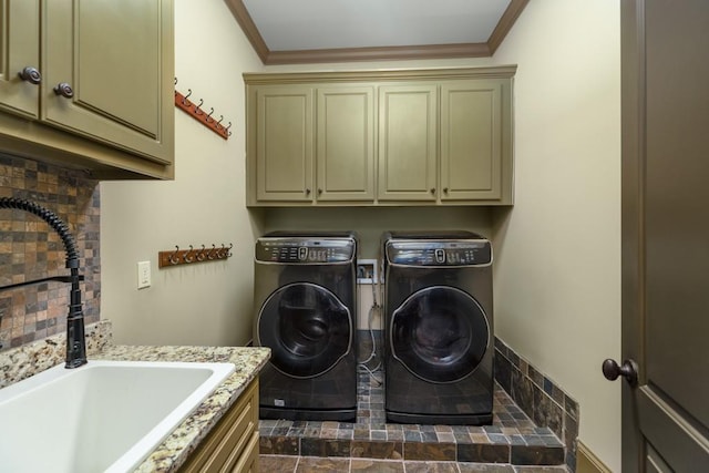 2740 Drayton Hall Dr, Buford, GA 30519 - washroom featuring cabinet space, ornamental molding, independent washer and dryer, and a sink