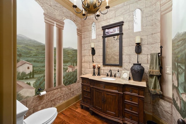 2740 Drayton Hall Dr, Buford, GA 30519 - bathroom with toilet, an inviting chandelier, vanity, and plenty of natural light