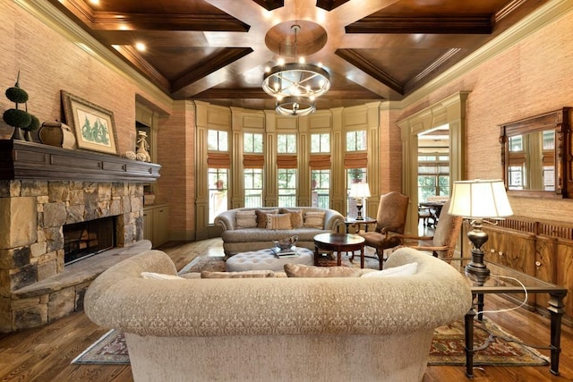 2740 Drayton Hall Dr, Buford, GA 30519 - living area with crown molding, a stone fireplace, a chandelier, wood finished floors, and coffered ceiling