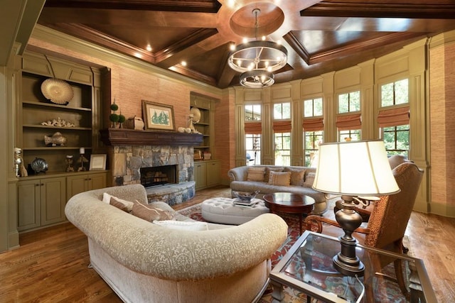 2740 Drayton Hall Dr, Buford, GA 30519 - living room featuring built in features, ornamental molding, a stone fireplace, wood finished floors, and coffered ceiling