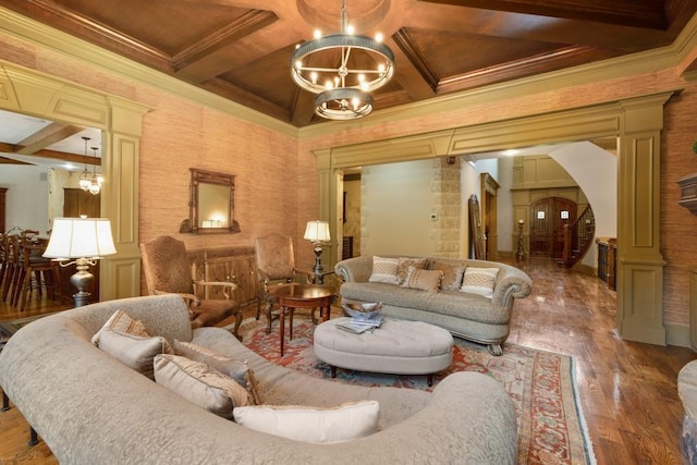 2740 Drayton Hall Dr, Buford, GA 30519 - living area featuring coffered ceiling, arched walkways, and a chandelier