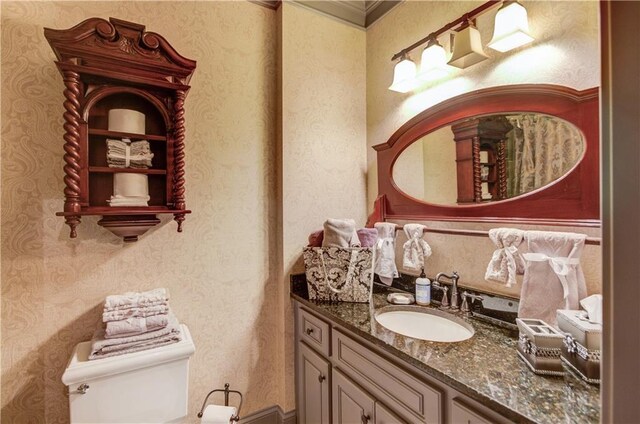 2740 Drayton Hall Dr, Buford, GA 30519 - bathroom featuring toilet, vanity, and wallpapered walls