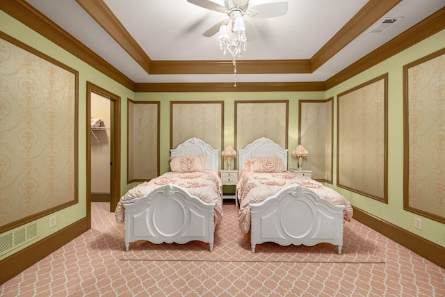 2740 Drayton Hall Dr, Buford, GA 30519 - carpeted bedroom featuring a walk in closet, visible vents, ornamental molding, and ceiling fan
