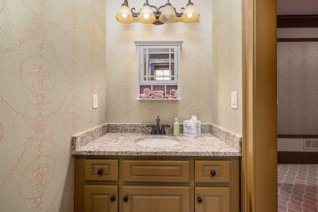 2740 Drayton Hall Dr, Buford, GA 30519 - bathroom featuring wallpapered walls, vanity, and visible vents