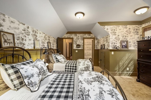 2740 Drayton Hall Dr, Buford, GA 30519 - bedroom featuring crown molding, vaulted ceiling, a wainscoted wall, light carpet, and wallpapered walls