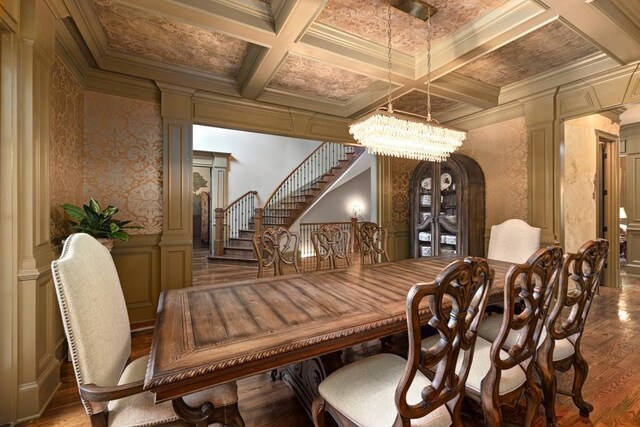 2740 Drayton Hall Dr, Buford, GA 30519 - dining room featuring coffered ceiling, a decorative wall, beamed ceiling, and a notable chandelier