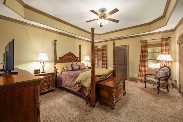 2740 Drayton Hall Dr, Buford, GA 30519 - carpeted bedroom featuring ornamental molding, baseboards, a ceiling fan, and a tray ceiling