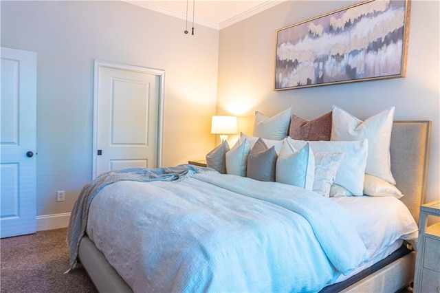 carpeted bedroom featuring ornamental molding and baseboards