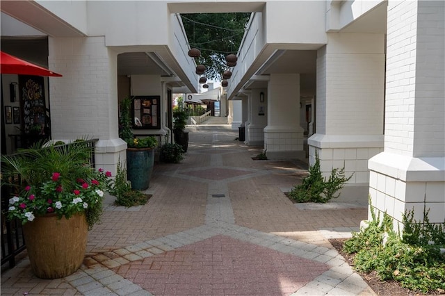 exterior space featuring brick siding