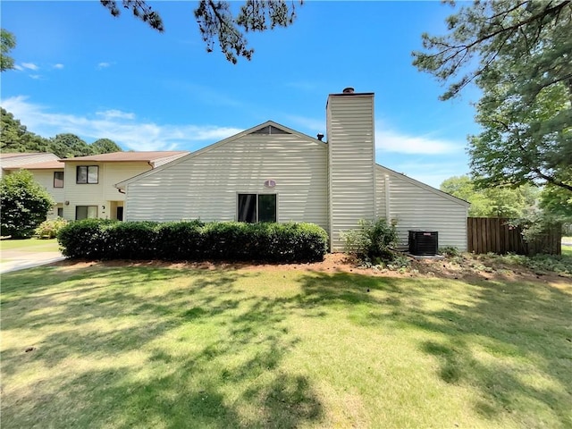 1152 Country Ct, Lawrenceville, GA 30044 - view of home's exterior with a chimney and a cooling unit
