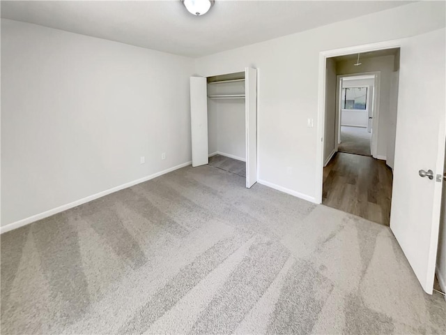 1152 Country Ct, Lawrenceville, GA 30044 - unfurnished bedroom with carpet, a closet, and attic access