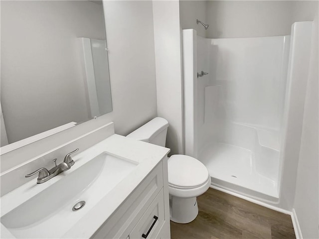 1152 Country Ct, Lawrenceville, GA 30044 - full bathroom with wood finished floors, vanity, and a shower