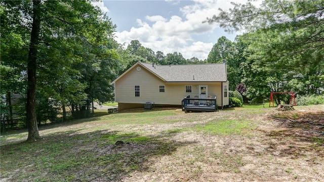 188 Crystal Creek Dr, Jasper, GA 30143 - back of property with a deck, a lawn, and view of wooded area