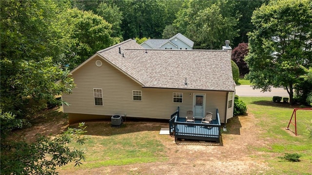 188 Crystal Creek Dr, Jasper, GA 30143 - back of house featuring a wooden deck, a shingled roof, and a lawn