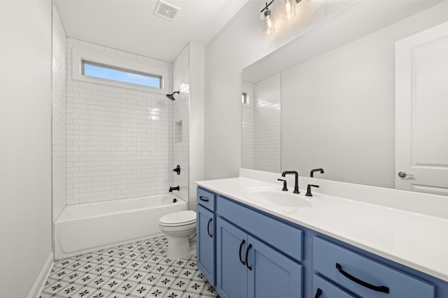 full bath with bathtub / shower combination, vanity, toilet, tile patterned floors, and visible vents
