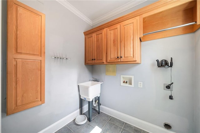 clothes washing area featuring baseboards, cabinet space, electric dryer hookup, tile patterned flooring, and crown molding