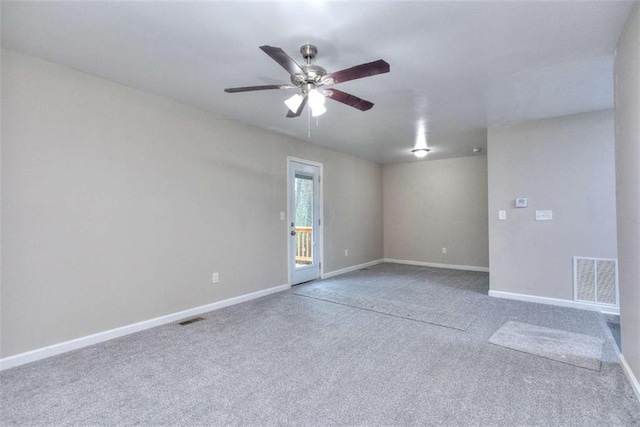 unfurnished room featuring carpet floors and ceiling fan