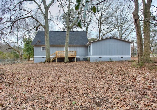 rear view of property with a deck