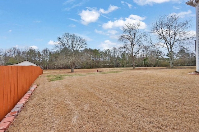 view of yard with fence