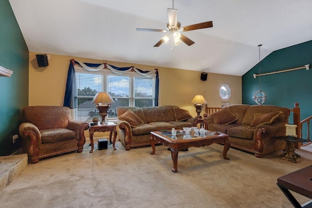 living room featuring carpet, vaulted ceiling, and ceiling fan