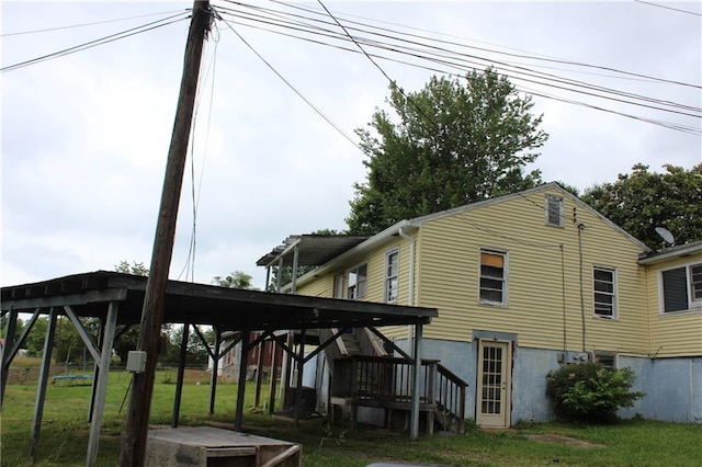 view of home's exterior featuring a lawn