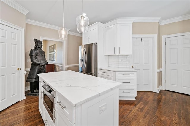 997 Thousand Oaks Bnd NW, Kennesaw, GA 30152 - kitchen with stainless steel appliances, ornamental molding, dark wood-style floors, white cabinetry, and tasteful backsplash