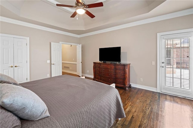 997 Thousand Oaks Bnd NW, Kennesaw, GA 30152 - bedroom with a raised ceiling, wood finished floors, access to outside, baseboards, and ceiling fan