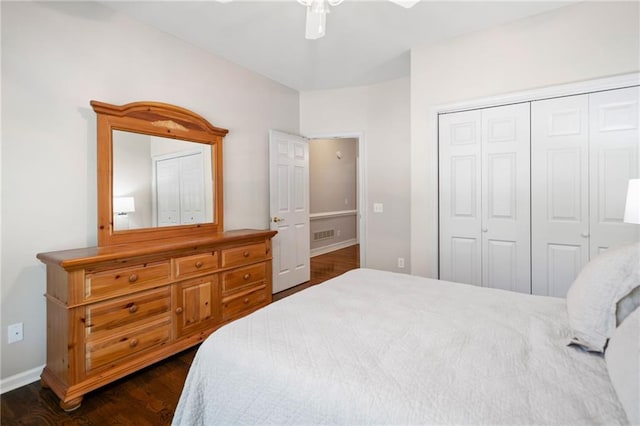997 Thousand Oaks Bnd NW, Kennesaw, GA 30152 - bedroom with baseboards, a closet, dark wood-style flooring, and ceiling fan